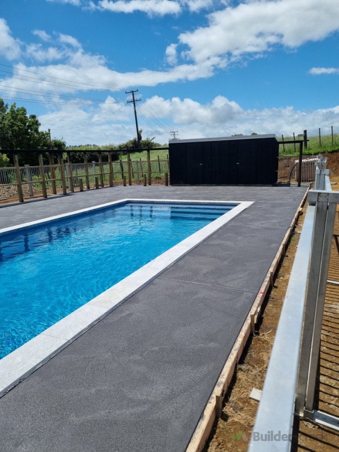 Fresh black concrete with swirl finish, now onto the fences and bench seating