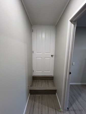 new  doorway added between new studio and main house