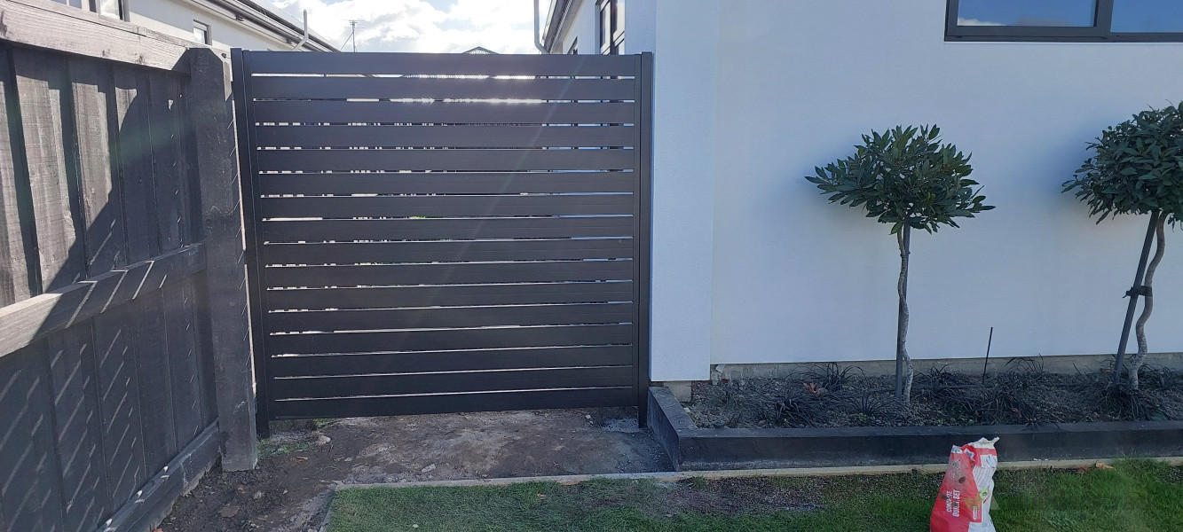 Horizontal slat fencing installation