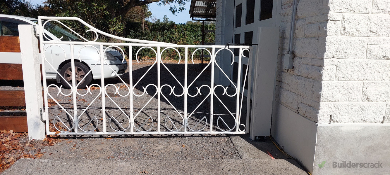 Gate modification to keep dogs on the property