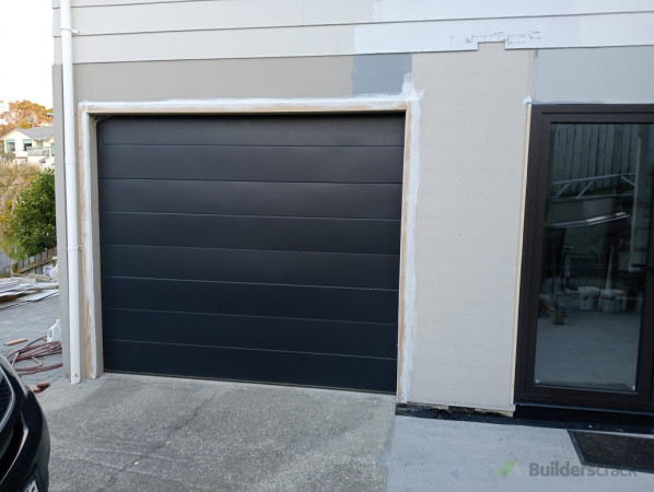 Completed - trim around garage door