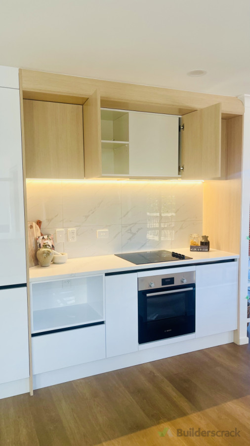 Waitakere project:-white acrylic with wooden contrast