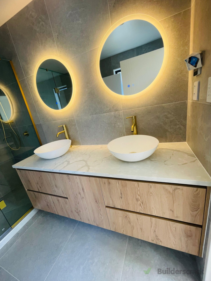Vanity with stone benchtop and LED mirrors