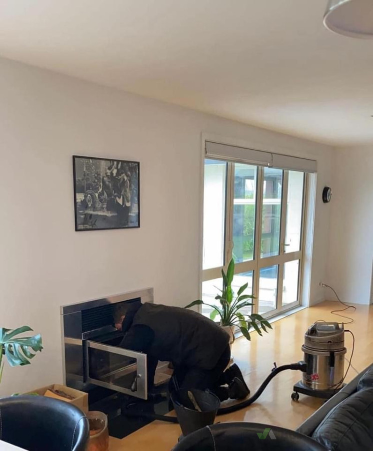 Chimney Sweep on Fireplace Insert