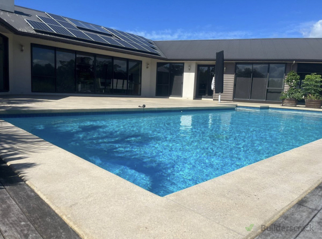 Residential pool area - bush hammered patio concrete for non-slip