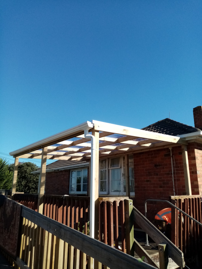 Pergola with downspouts gutter