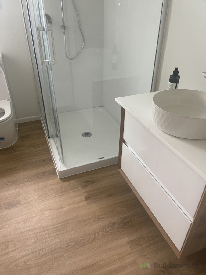 After finishing the SPC floor, Shower box, vanity,