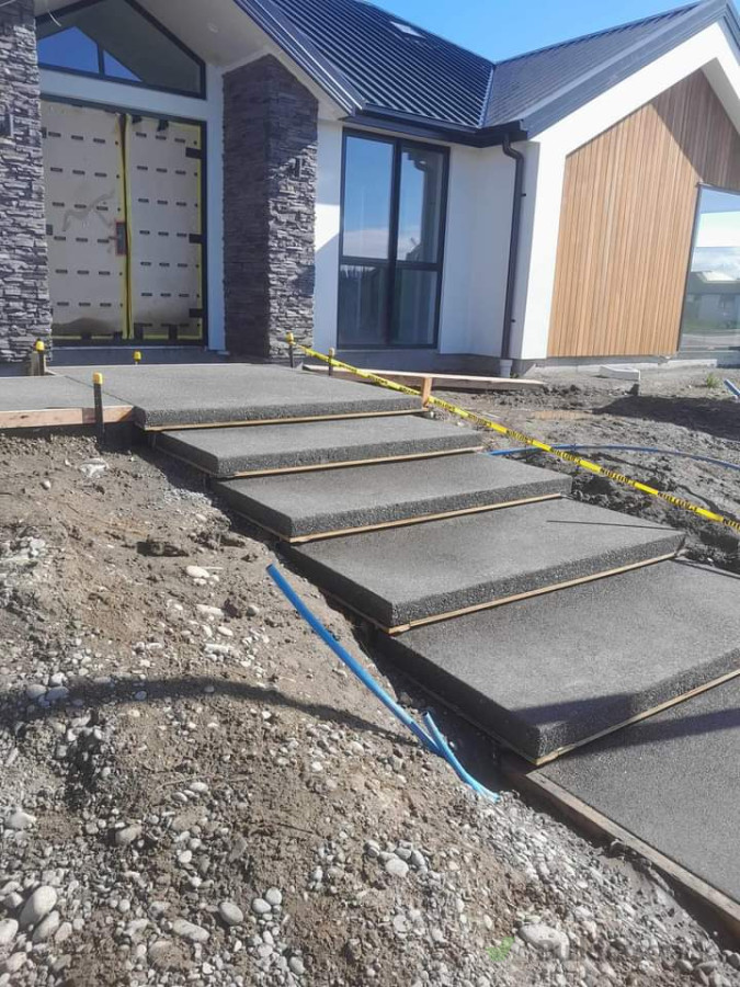 Concrete formwork and pours, these floating steps were created for our client in Rolleston