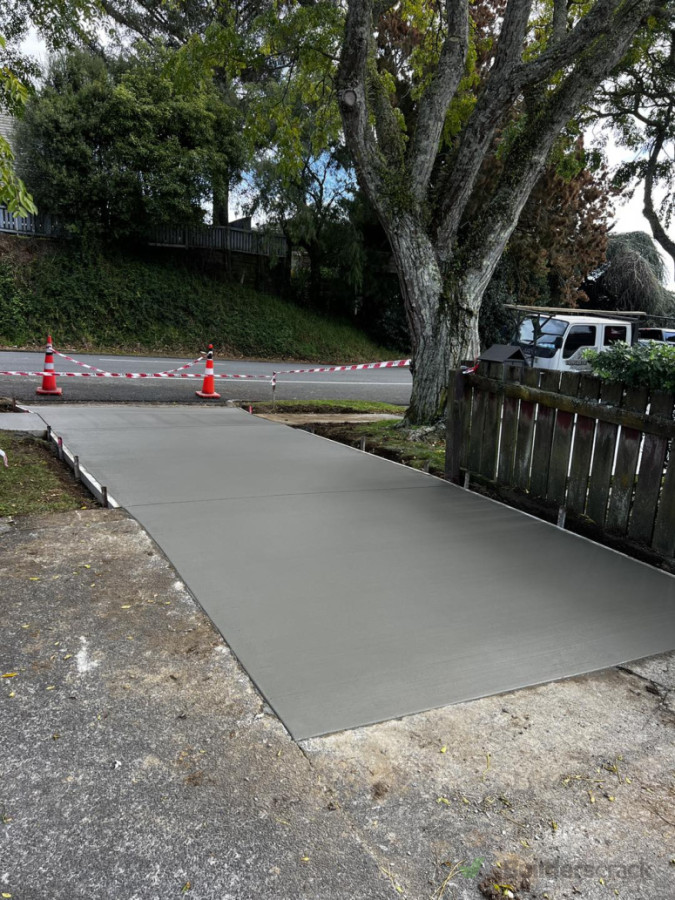 Dug up and replaced concrete due to tree roots lifting the existing concrete
