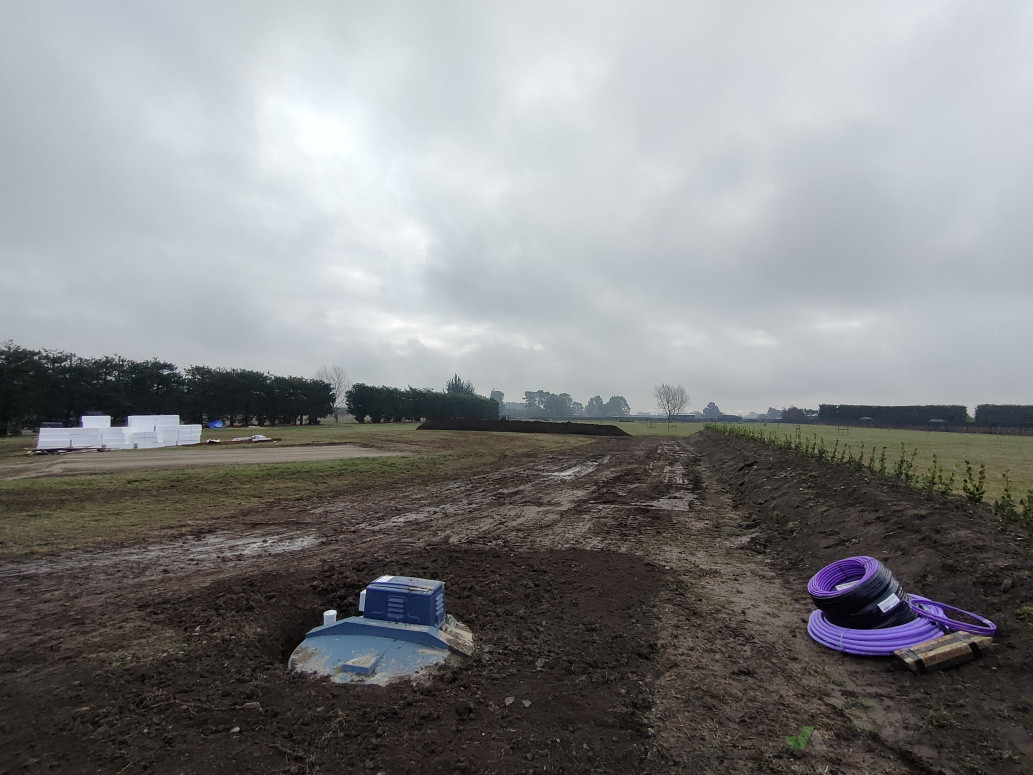 Bunds installed for wind protection and planted out in native plants. House foundation's finished and ready for concrete.  Site tidy and ready for building