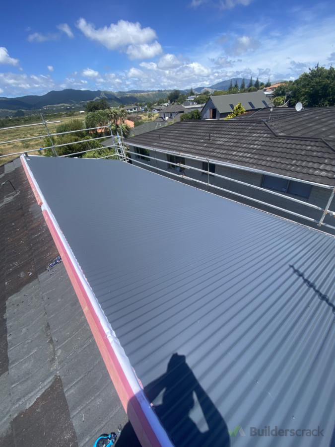 First half of roof done