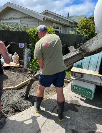 Foundation Setup: Initial stages of the carport installation, with foundational poles securely in place, laying the groundwork for a robust and long-lasting structure.