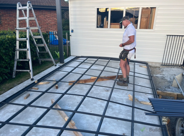 Roof Preparation: Detailed work on the carport’s roof grid, showcasing the careful planning and execution that goes into every project.