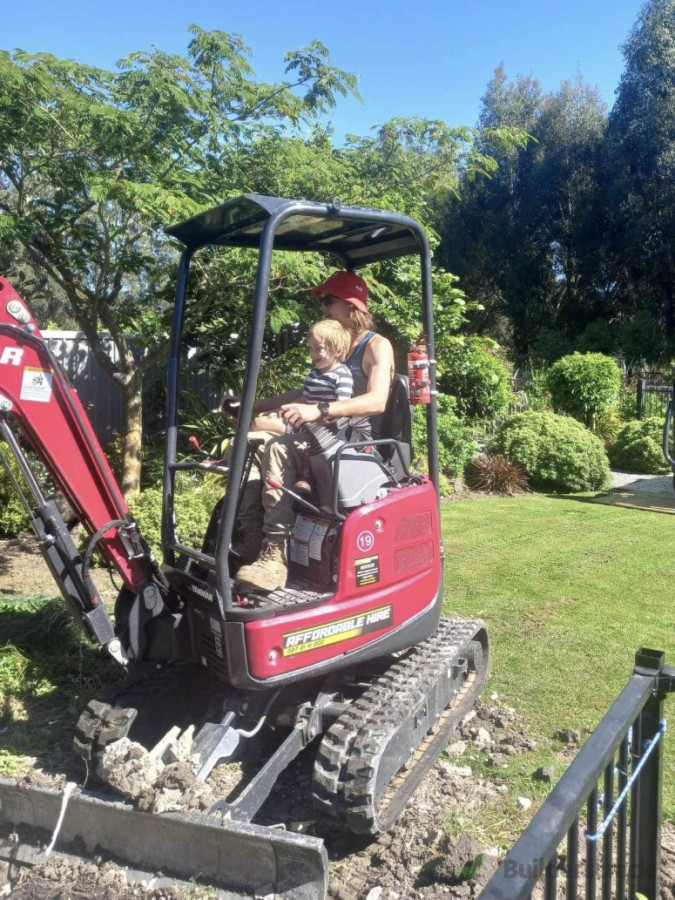 Our wee apprentice on the job helping to dig out some trenches for a house extension