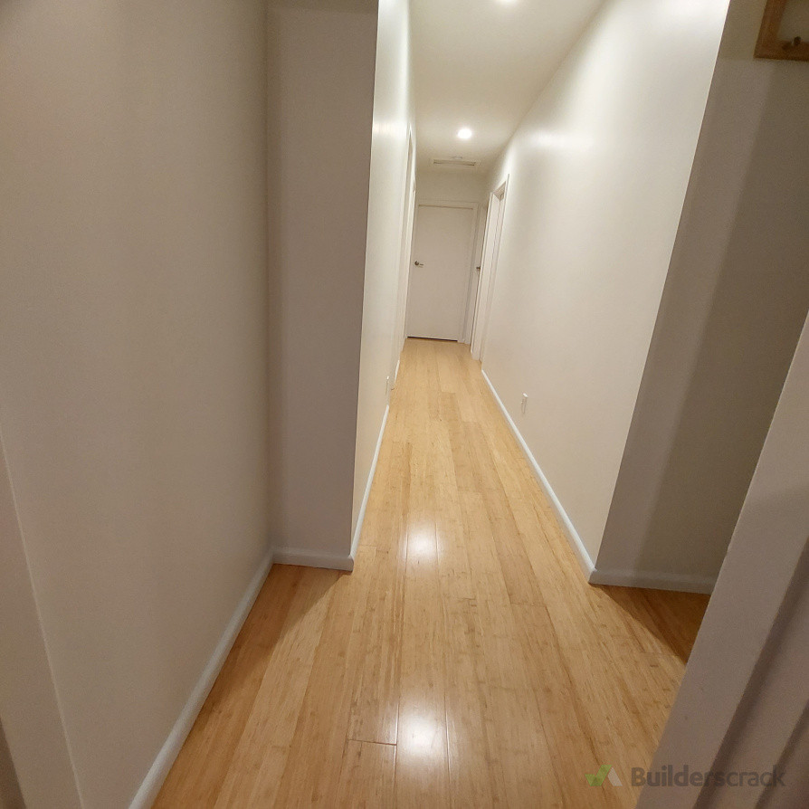 Repaint and install new bamboo flooring in hallway