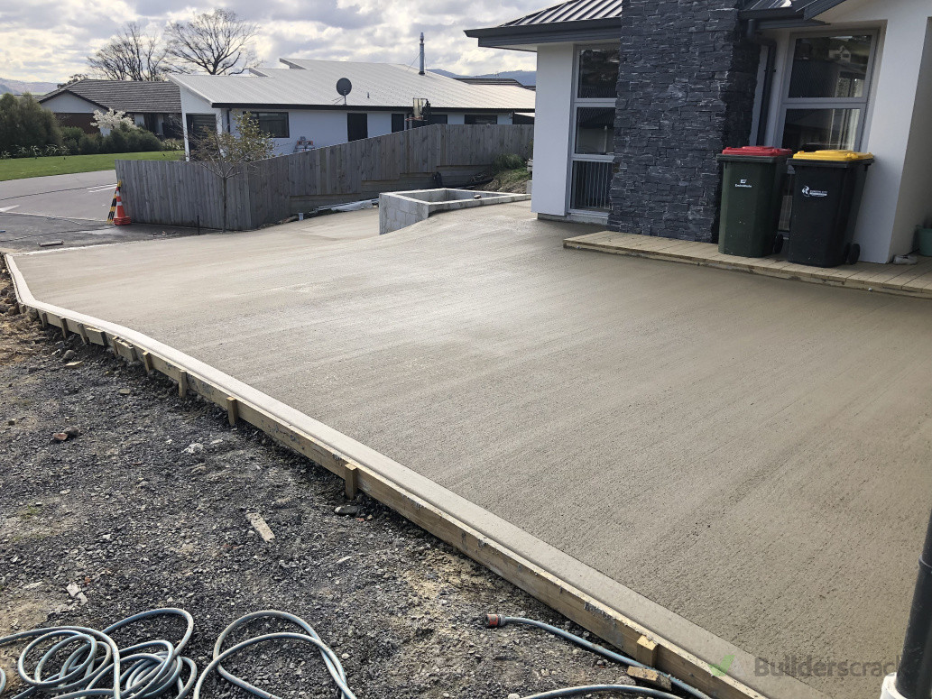 Example of broom finish concrete with feature border