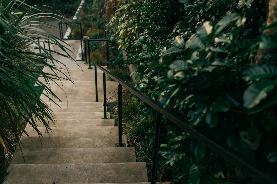 In-situe concrete stairs with steel fabricated handrail, native planting