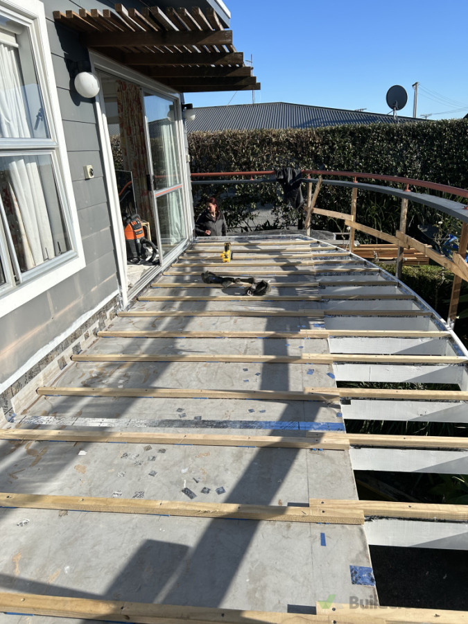 Before: Old deck in process of becoming new