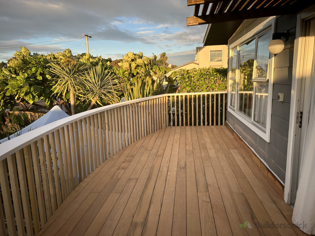 After: Gorgeous new deck with curved handrail