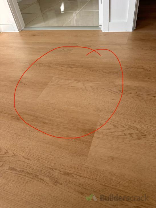 Fixing spc floor wobble hollow spot under ( 1010504) Builderscrack