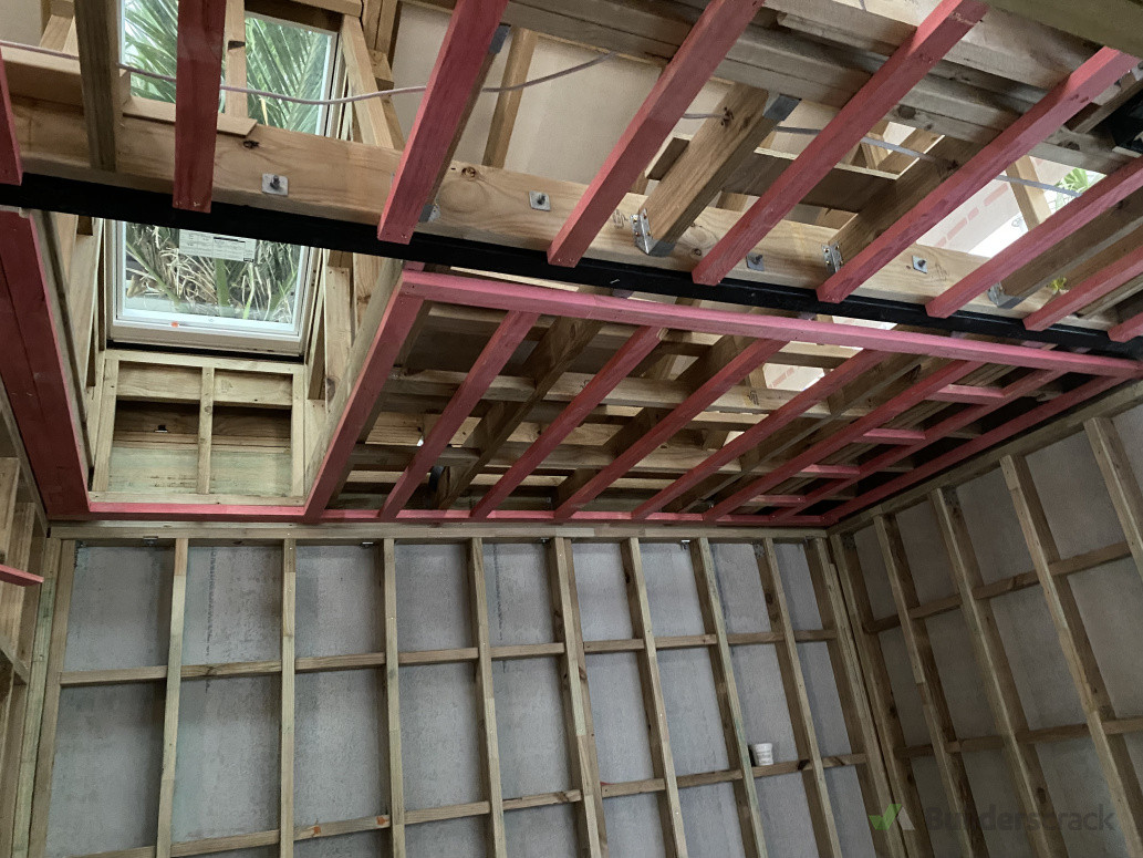 Building a fireproof timber wall, framed up ceiling, and installation of skylight, framed ceiling,