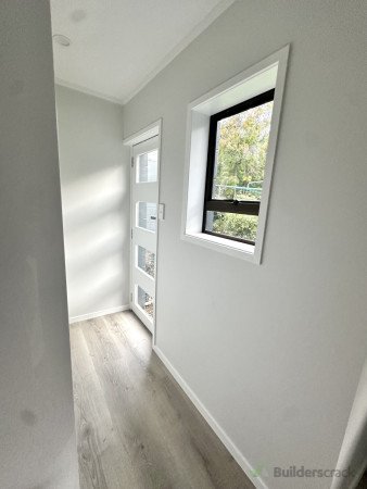 New back door & surrounding trim, all new gib & flooring