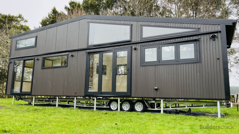 Proud tiny house on screws