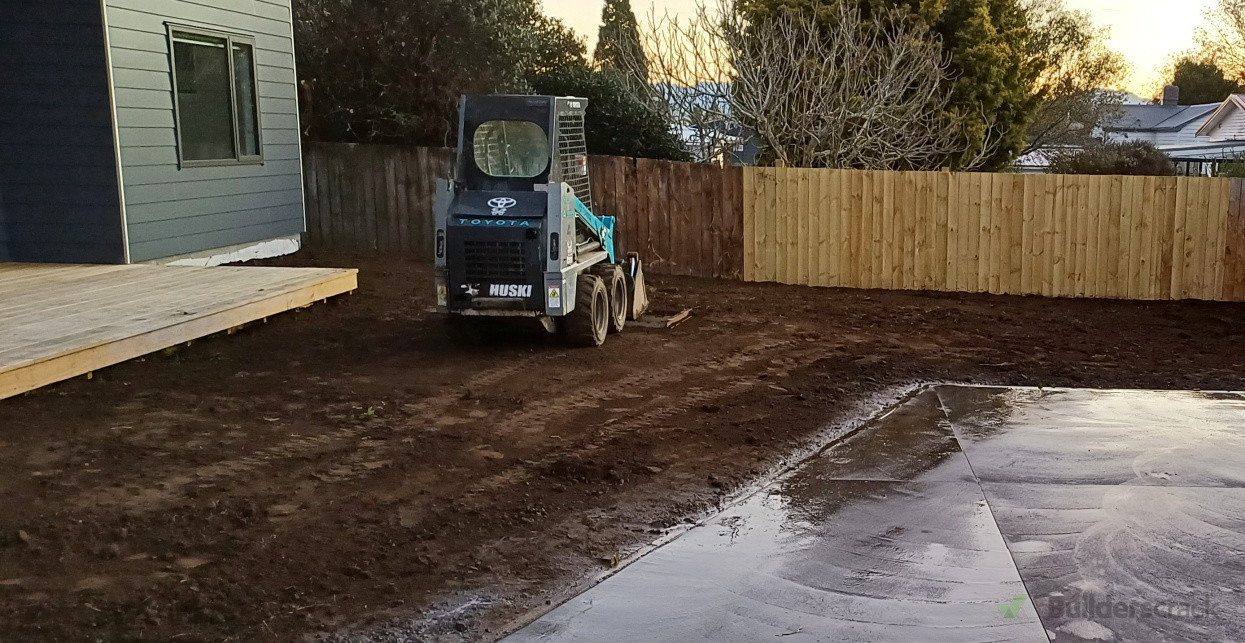 New Fence, Deck and topsoil spreading and levelling.