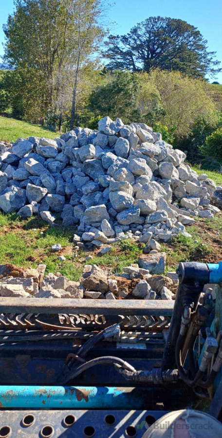 Carting rocks for spillway.