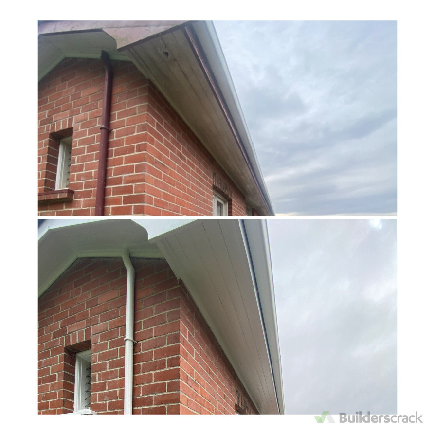 Repainted this soffit and downpipe white. Before and after