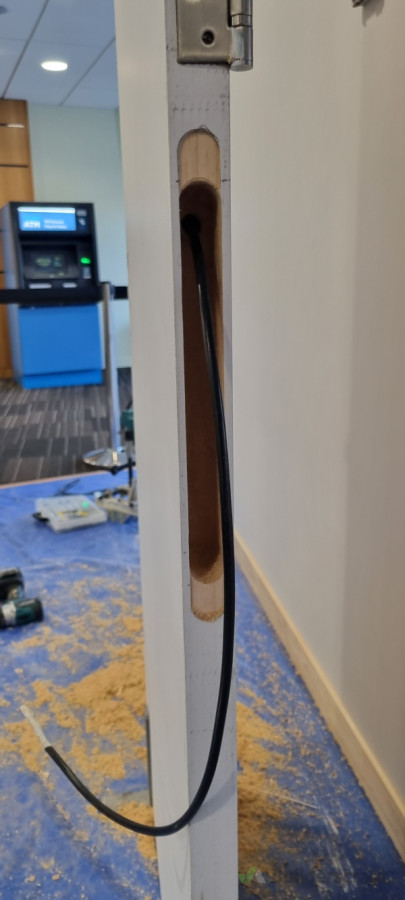 Preparing door for electronic look installation