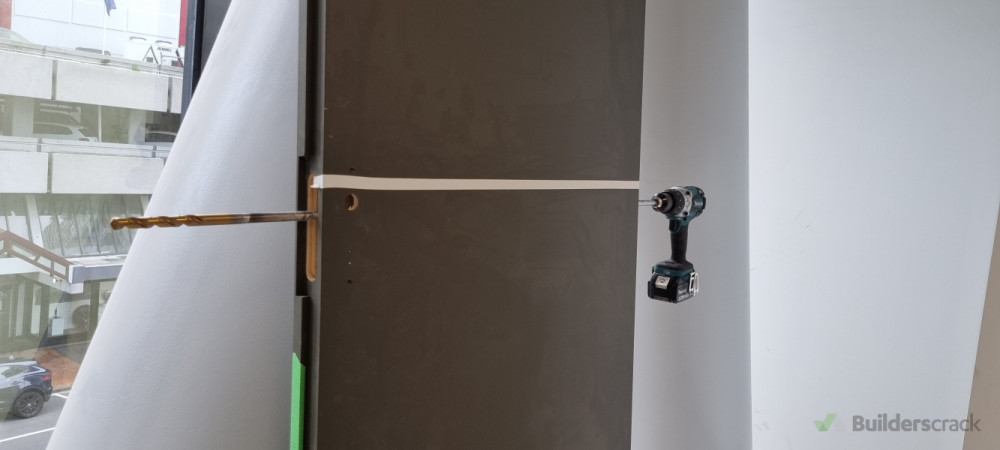 Preparing door for electronic look installation