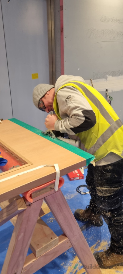 Preparing door for electronic look installation