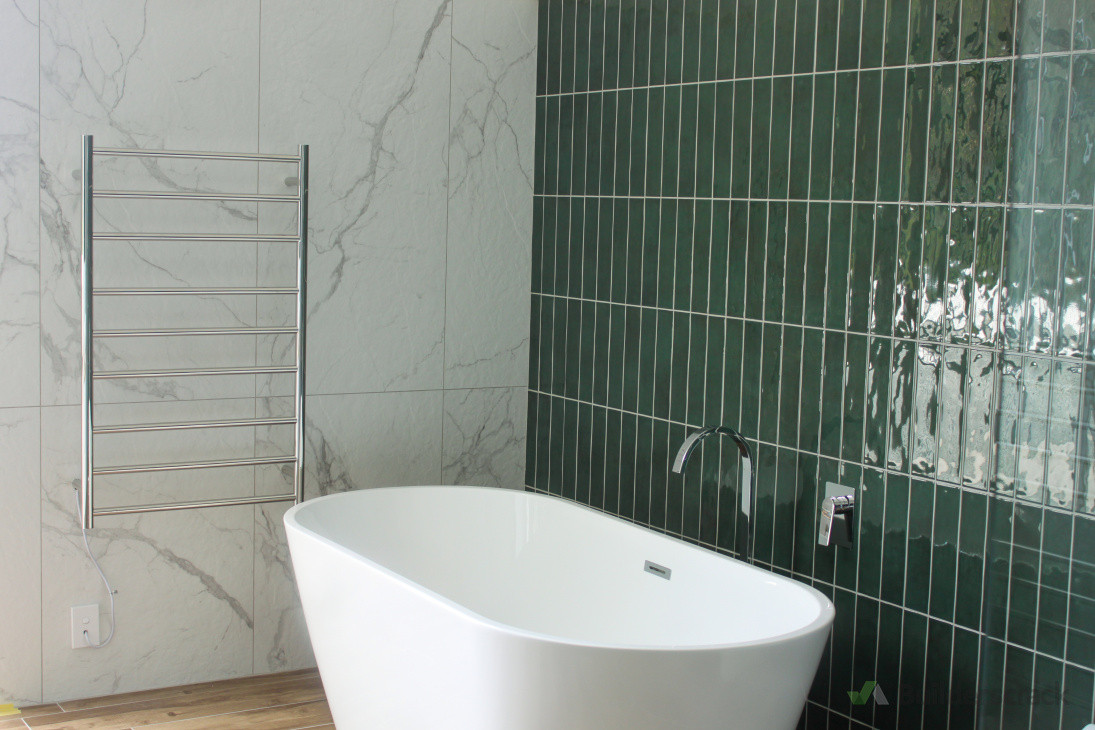 A fresh new look for this tired bathroom! Modern, clean, and built to last. 🚿✨