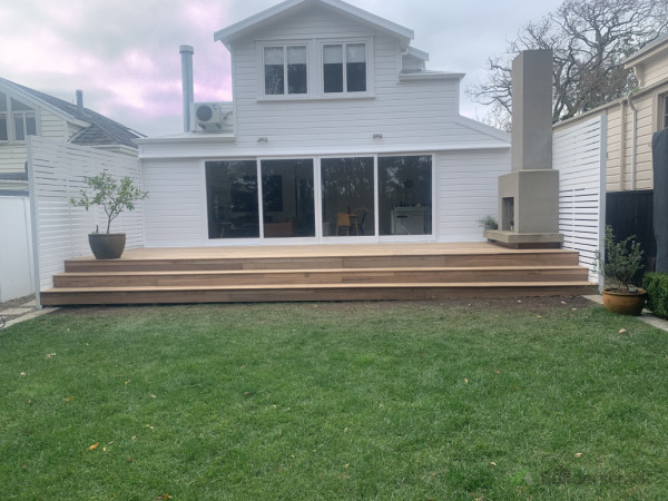 Fire place coming out of new deck