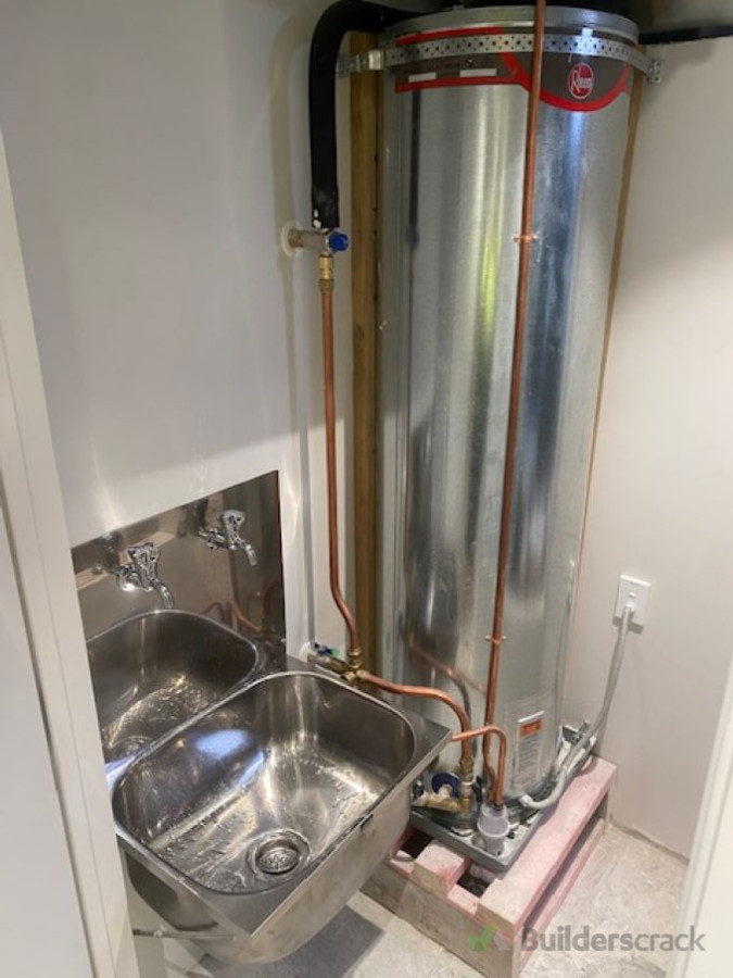 New Hot water cylinder and cleaners sink install