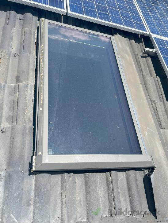 Fix leak around skylight concrete tile roof ( 1031258) Builderscrack