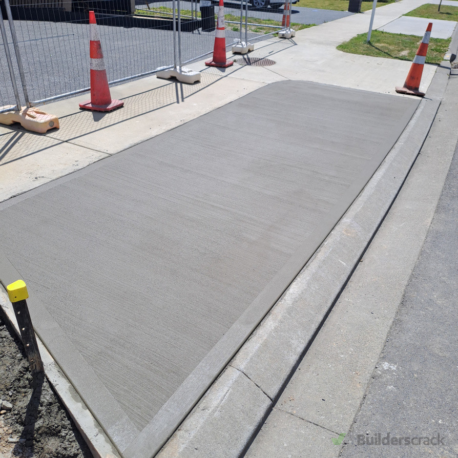 Vehicle crossing to driveway.