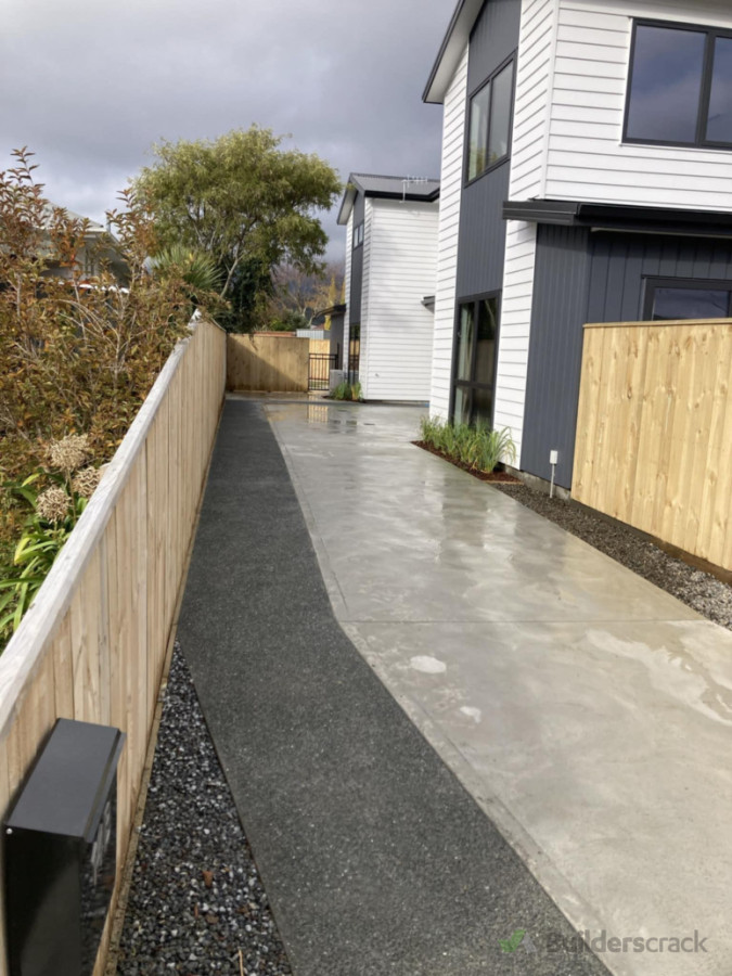 Driveway with exposed aggregate footpath, landscaping.