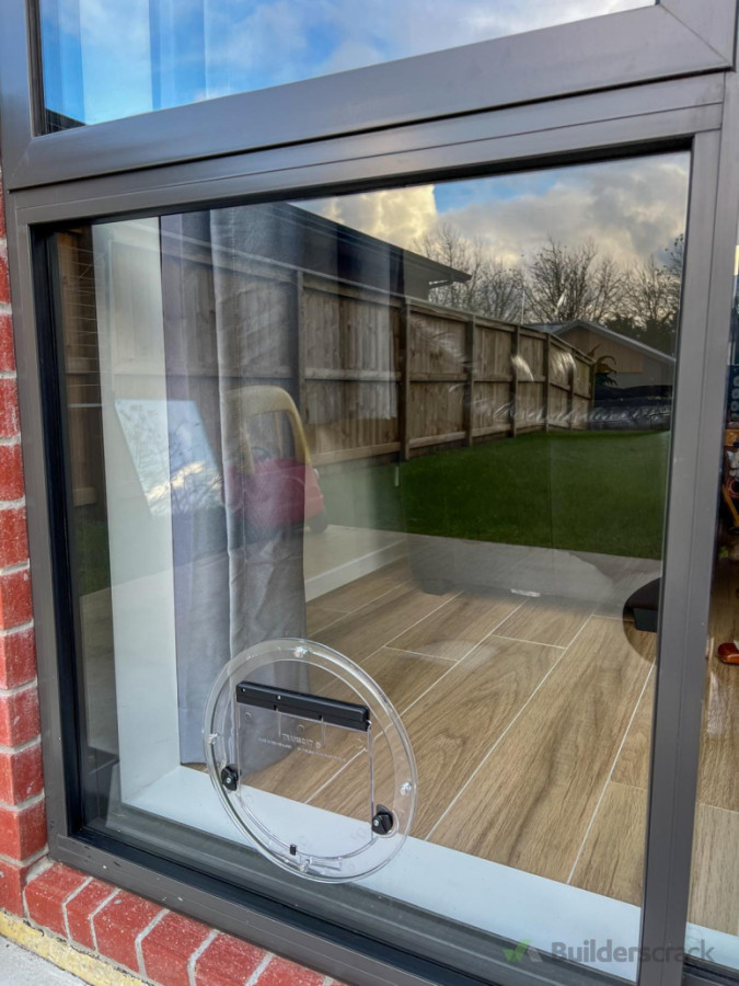 Double-glazed swapped to single glazed + cat door installed