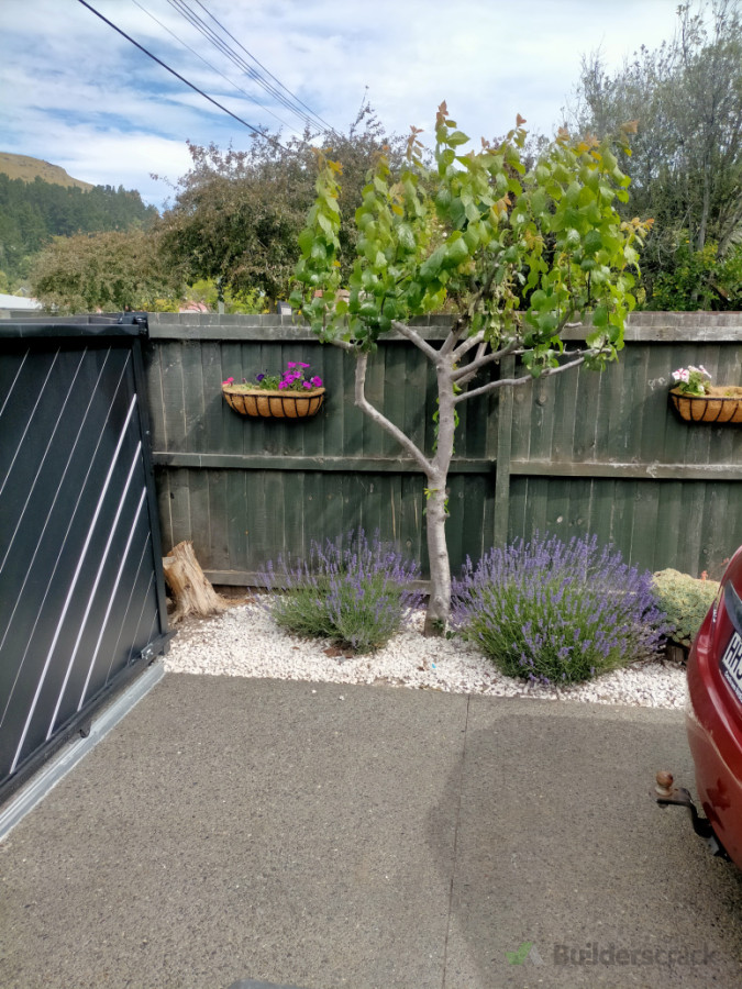 Install sliding gate landscape driveway