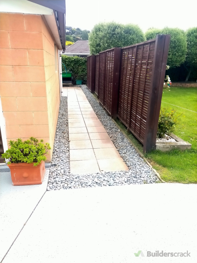 Lay pavers, erect Trellis landscape and plant