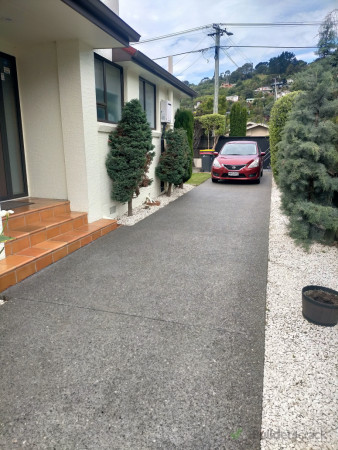 Plant trees fill garden beds with lime chop and seal driveway