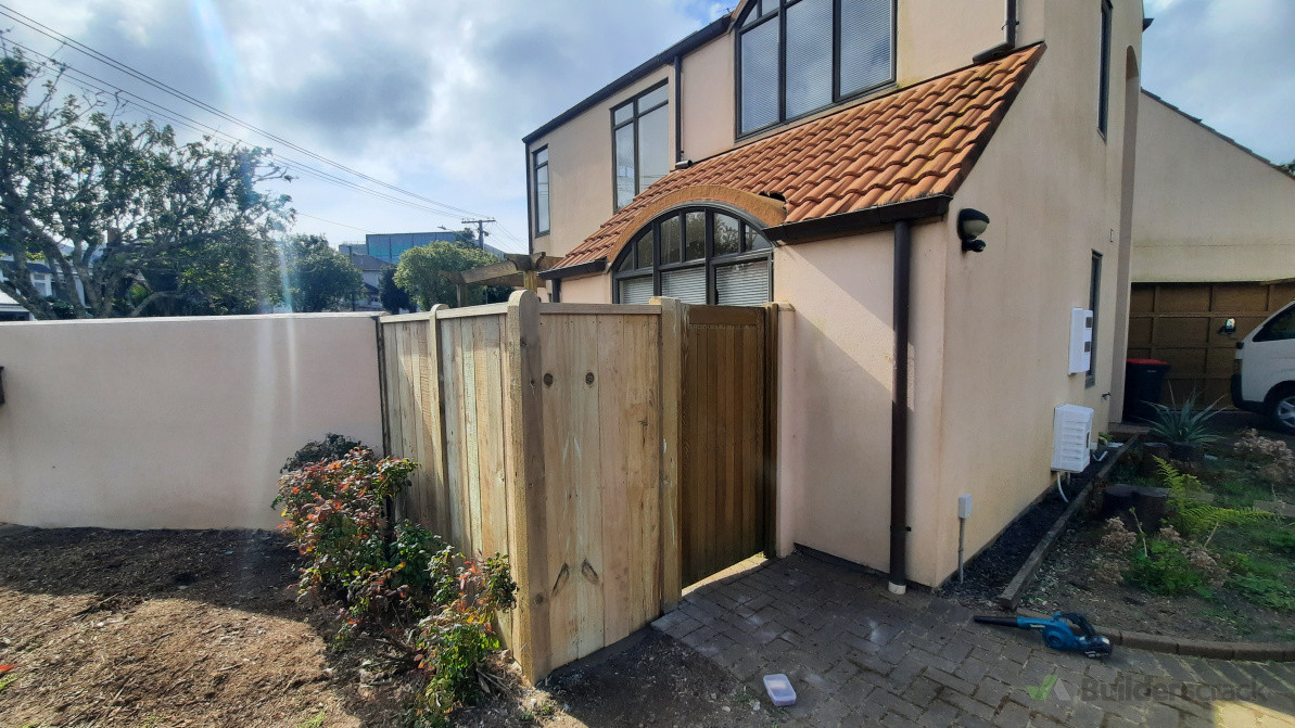 Insurance job. Replace part of the cracked concrete/plastered fence with standard timber palings. Posts shaved to customers request.