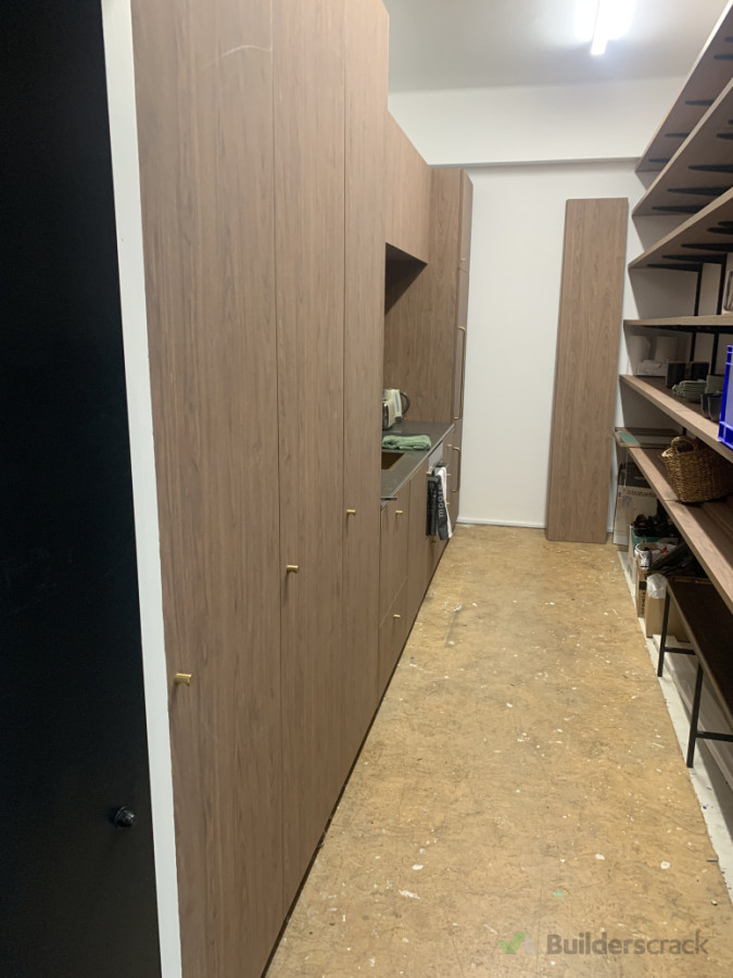 Private Office Wellington - Project Managed Supply and Install of Kitchen and open Shelving into an old safe.