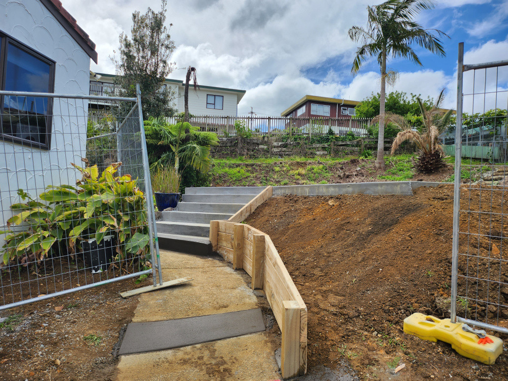 New retaining wall and steps to complete new concrete pool surrounding