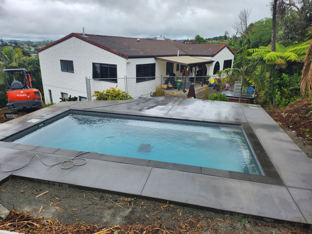 Concrete surrounding a new pool install
