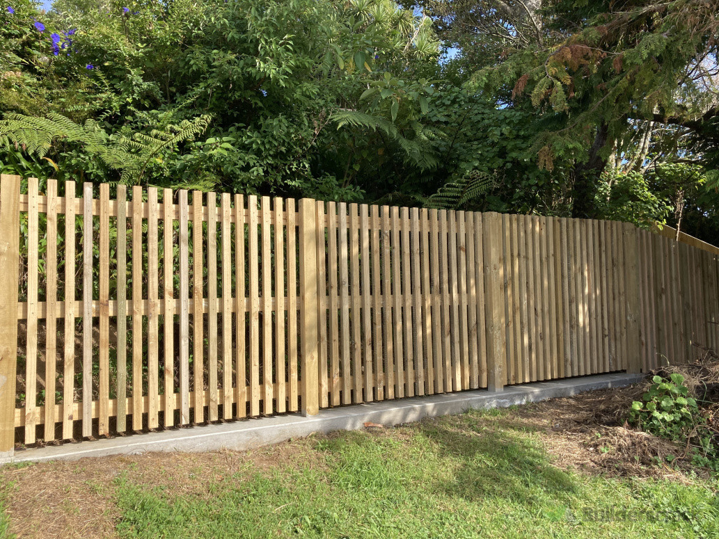 Mid section fencing for dog area, light sharing, mow strip for easy maintenance