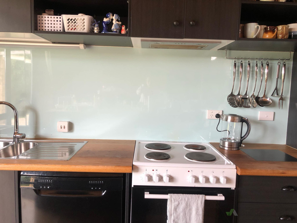 A newly installed, custom kitchen, with oak benchtops