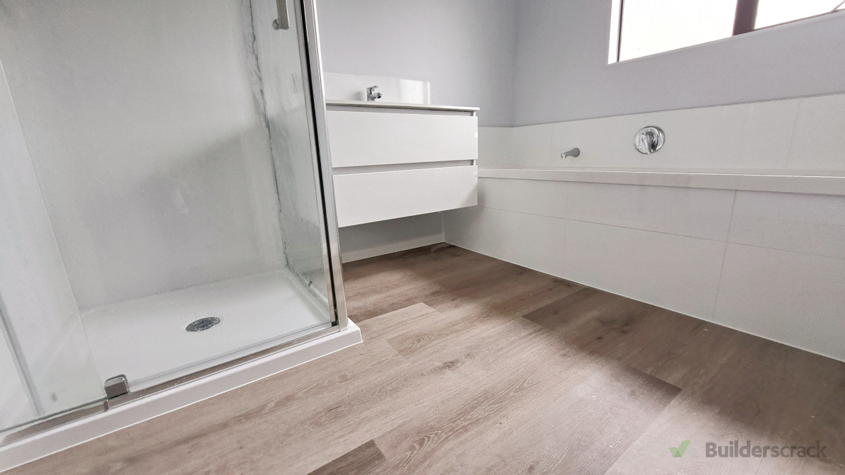 A newly Renovated Bathroom, reconfigured to best utilize space, and modernized for easy of use and cleaning.